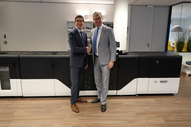 A business deal being closed in Ricoh 