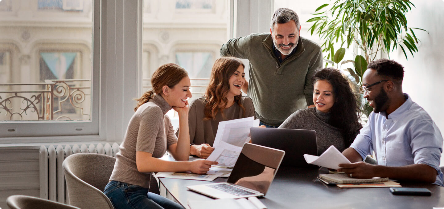 Mid-market business - people gathering at office environment