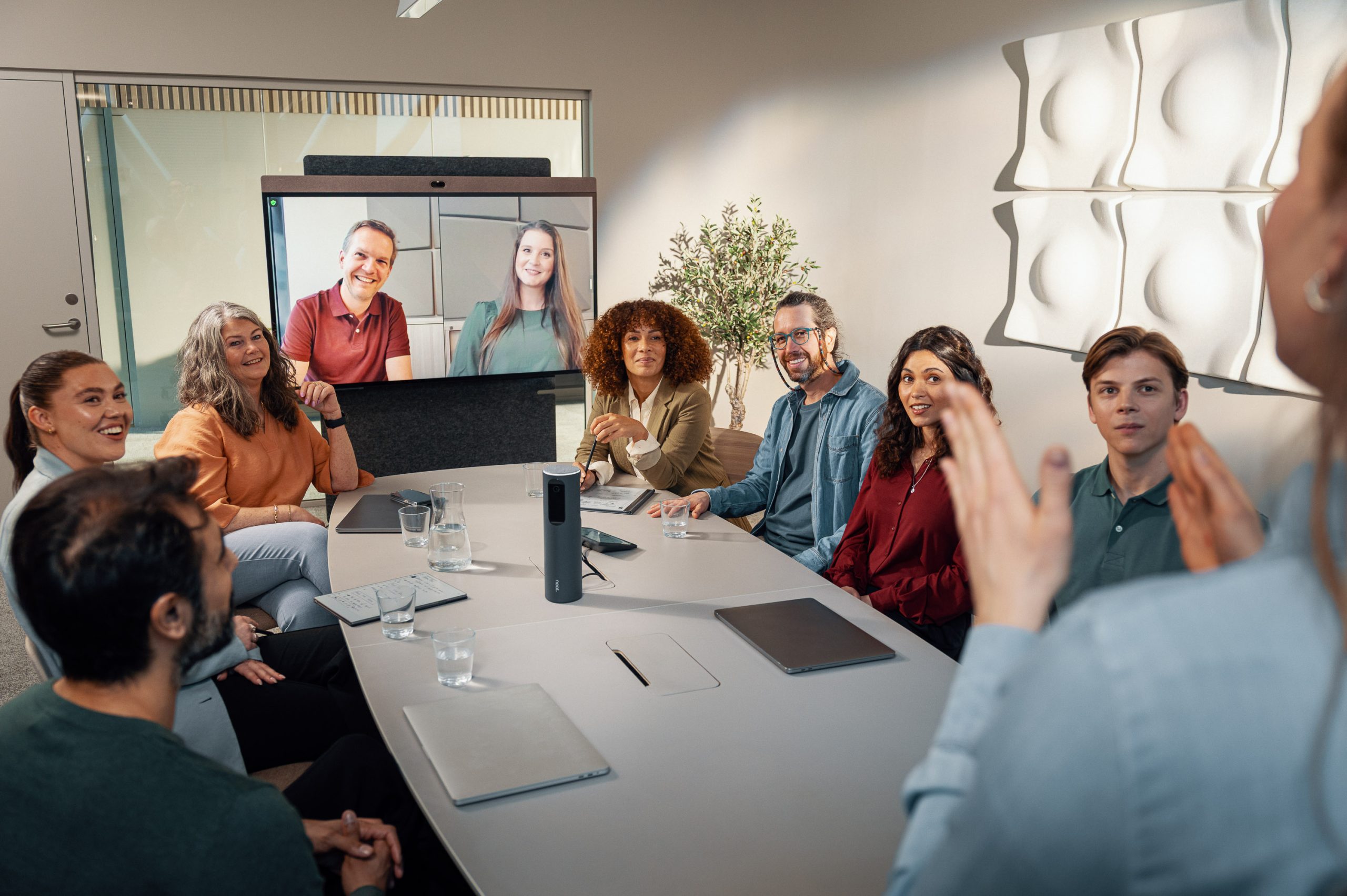 company meeting with happy and interested people