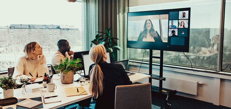 People looking at a screen